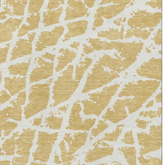 Gold And Ivory Abstract Washable Area Rug With UV Protection Photo 3