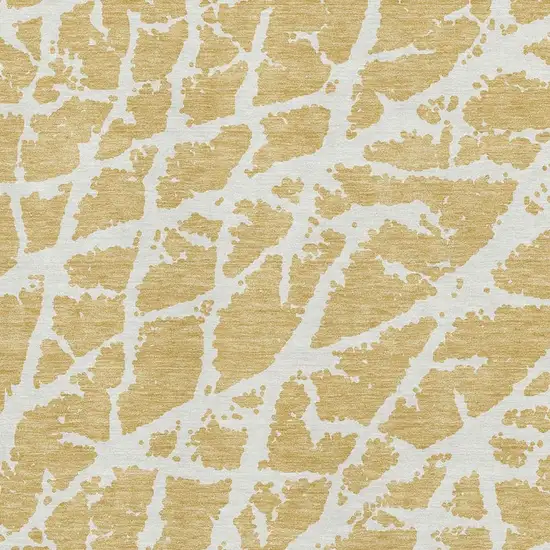 Gold And Ivory Abstract Washable Area Rug With UV Protection Photo 8
