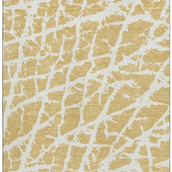 Gold And Ivory Abstract Washable Area Rug With UV Protection Photo 4