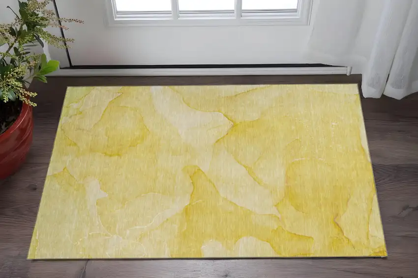 Gold And Ivory Abstract Washable Area Rug With UV Protection Photo 2