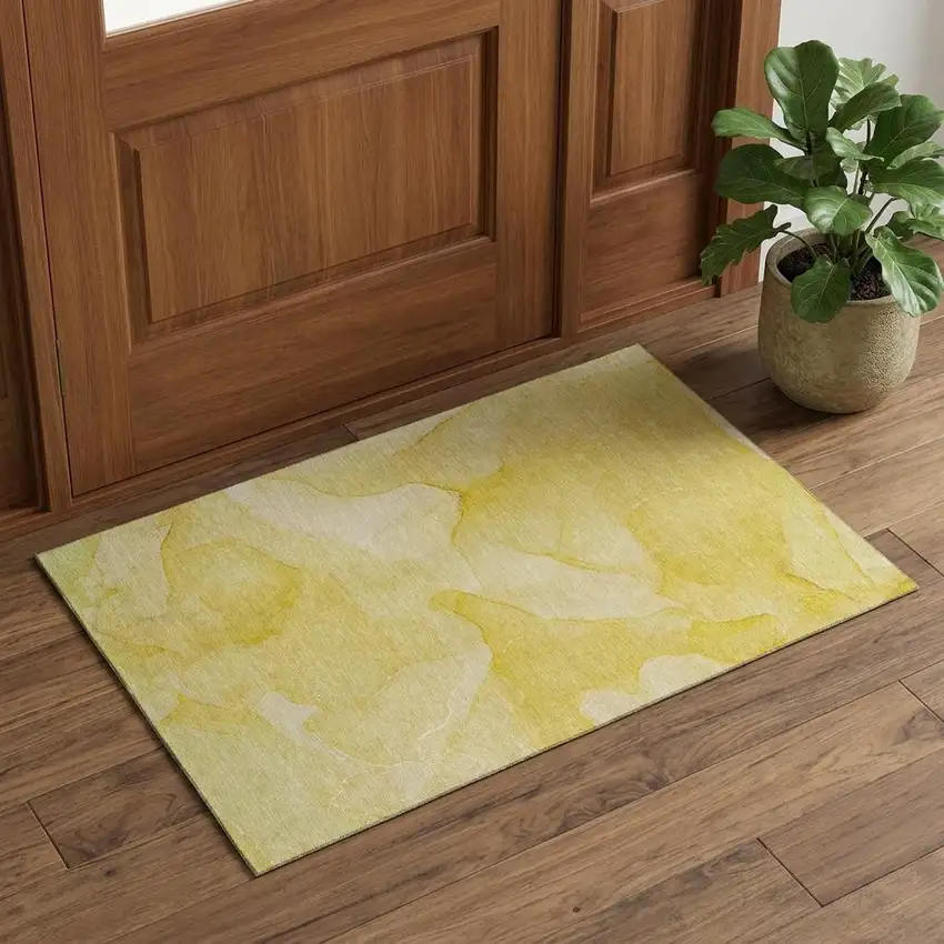 Gold And Ivory Abstract Washable Area Rug With UV Protection Photo 1