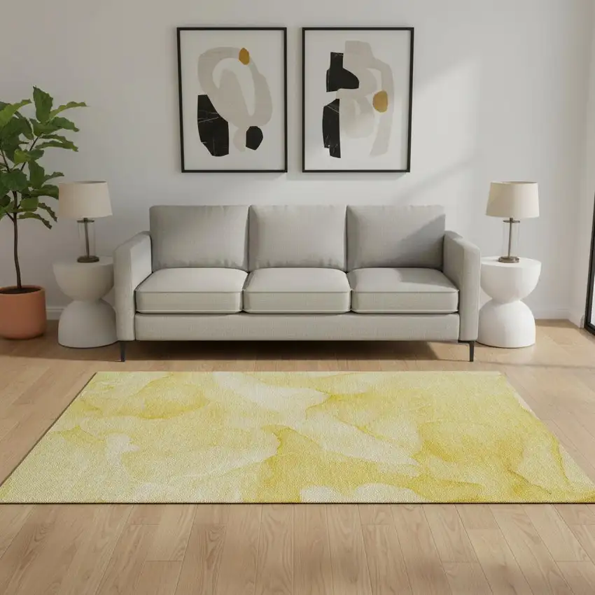 Gold And Ivory Abstract Washable Area Rug With UV Protection Photo 1