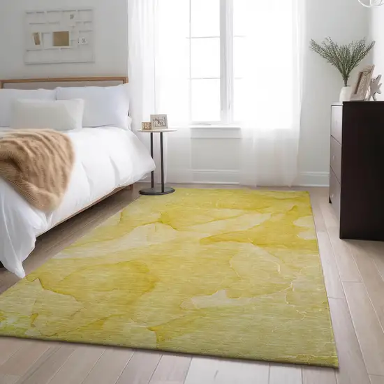 Gold And Ivory Abstract Washable Area Rug With UV Protection Photo 5
