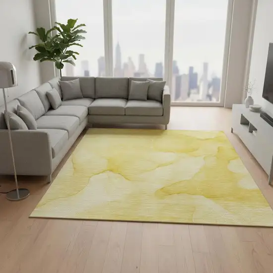 Gold And Ivory Abstract Washable Area Rug With UV Protection Photo 2