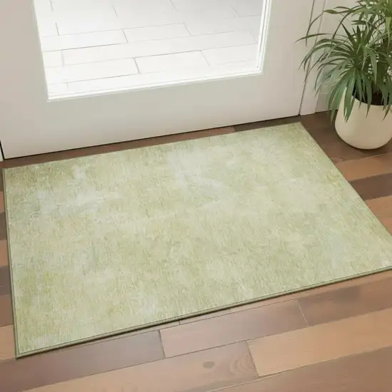 Gold And Ivory Abstract Washable Area Rug With UV Protection Photo 1