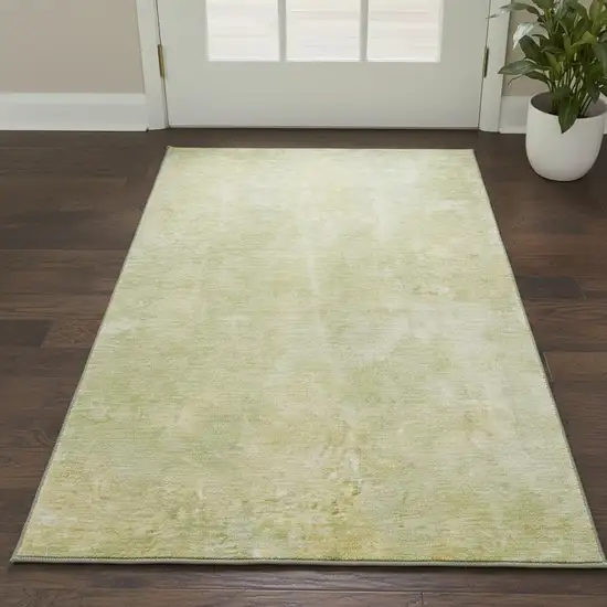 Gold And Ivory Abstract Washable Area Rug With UV Protection Photo 2