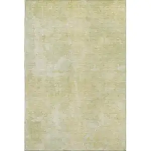 Photo of Gold And Ivory Abstract Washable Area Rug With UV Protection