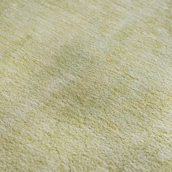 Gold And Ivory Abstract Washable Area Rug With UV Protection Photo 4