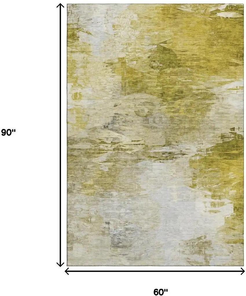 Gold And Ivory Abstract Washable Area Rug With UV Protection Photo 3