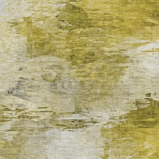 Gold And Ivory Abstract Washable Area Rug With UV Protection Photo 3