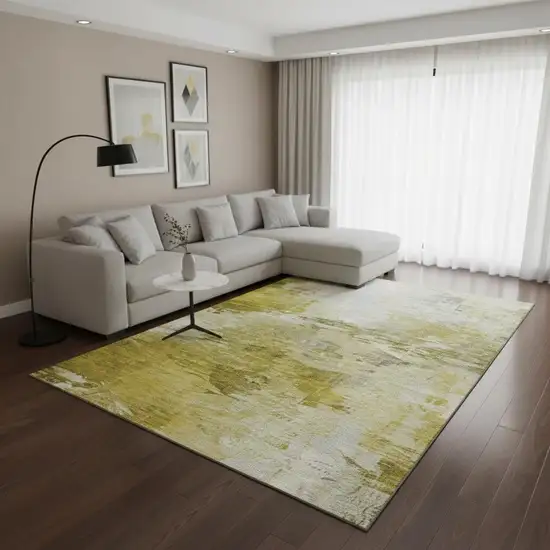 Gold And Ivory Abstract Washable Area Rug With UV Protection Photo 2