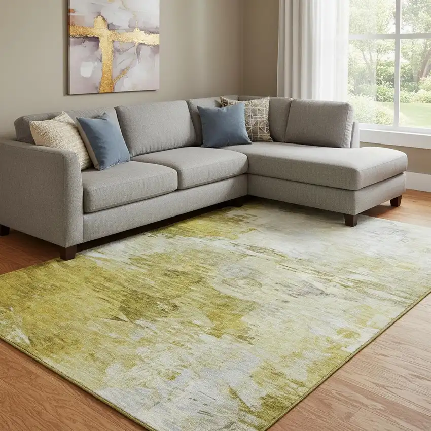 Gold And Ivory Abstract Washable Area Rug With UV Protection Photo 1