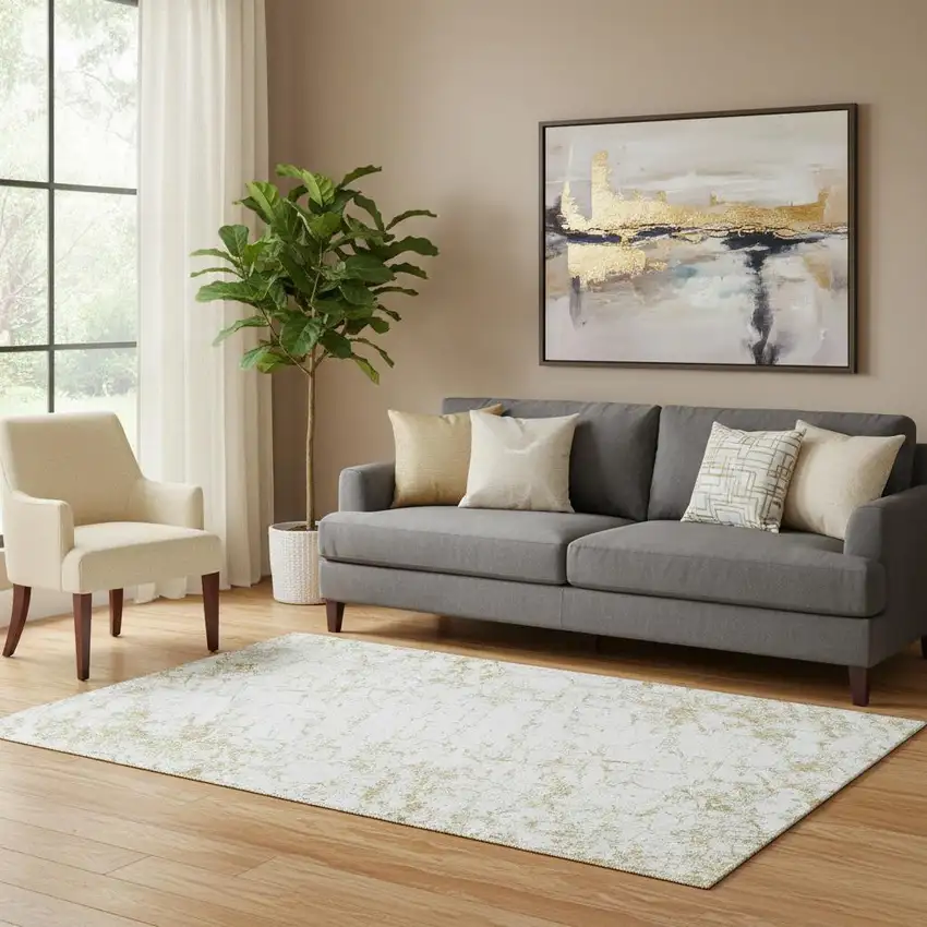 Gold And Ivory Abstract Washable Area Rug With UV Protection Photo 1