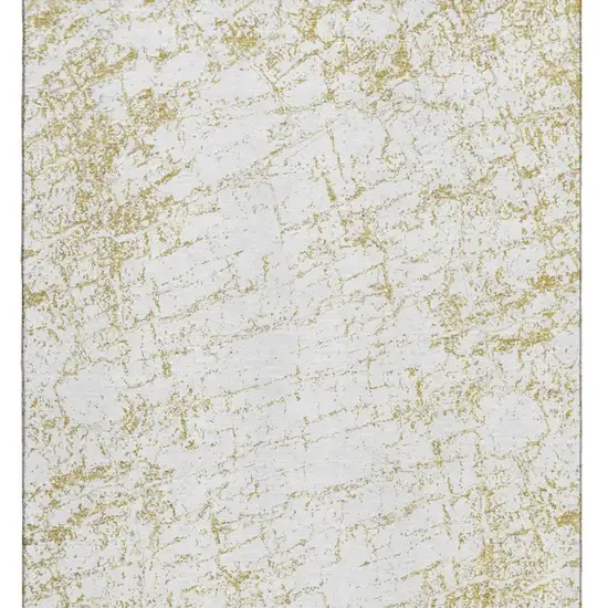 Gold And Ivory Abstract Washable Area Rug With UV Protection Photo 3