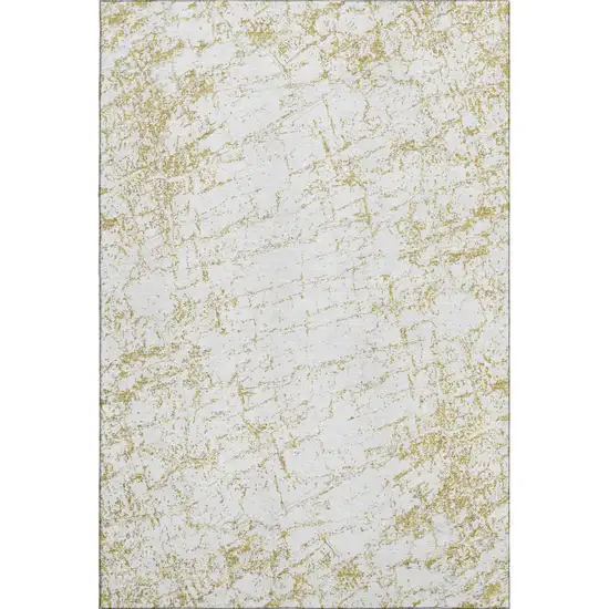 Gold And Ivory Abstract Washable Area Rug With UV Protection Photo 1