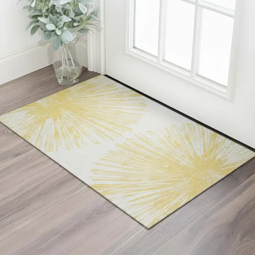 Gold And Ivory Abstract Washable Area Rug With UV Protection Photo 1
