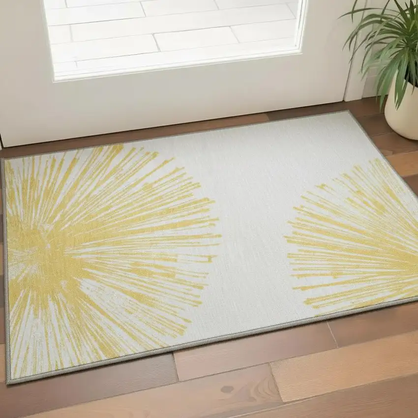 Gold And Ivory Abstract Washable Area Rug With UV Protection Photo 2