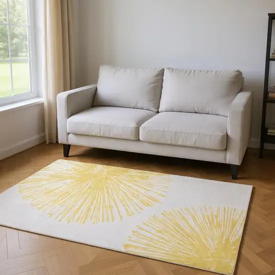 Gold And Ivory Abstract Washable Area Rug With UV Protection Photo 2