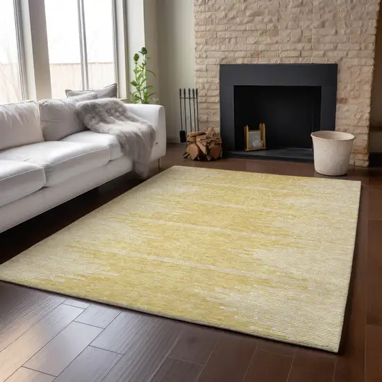 Gold And Ivory Abstract Washable Area Rug With UV Protection Photo 6