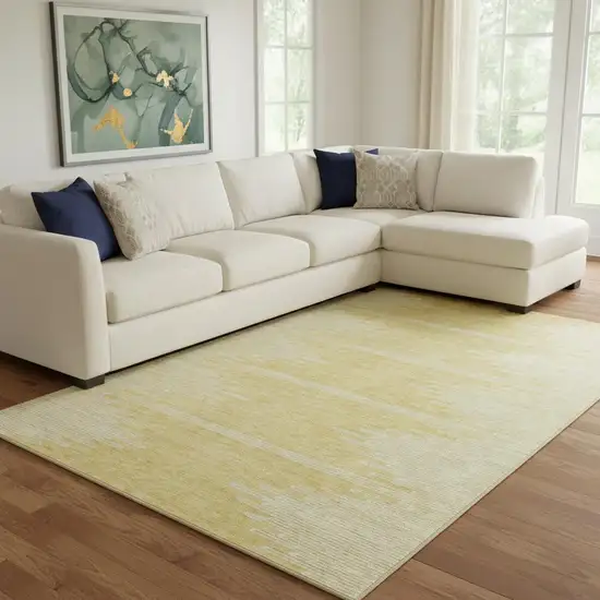 Gold And Ivory Abstract Washable Area Rug With UV Protection Photo 1