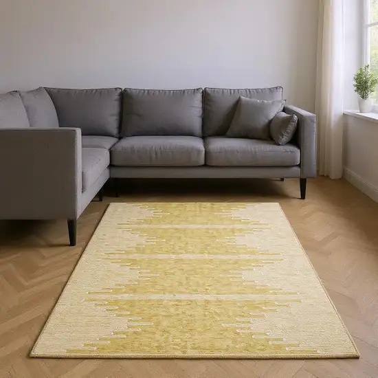 Gold And Ivory Abstract Washable Area Rug With UV Protection Photo 2