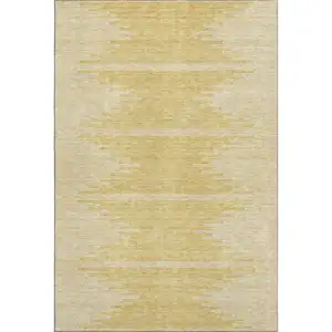 Photo of Gold And Ivory Abstract Washable Area Rug With UV Protection