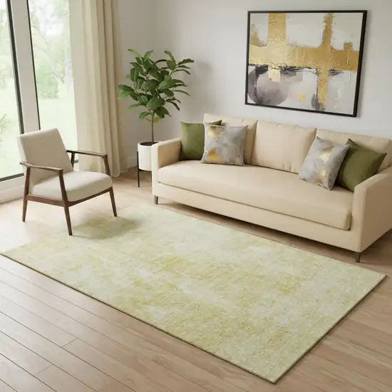 Gold And Ivory Abstract Washable Area Rug With UV Protection Photo 1
