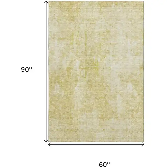 Gold And Ivory Abstract Washable Area Rug With UV Protection Photo 3