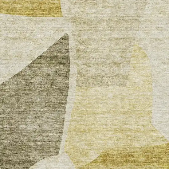 Gold And Ivory Abstract Washable Area Rug With UV Protection Photo 7