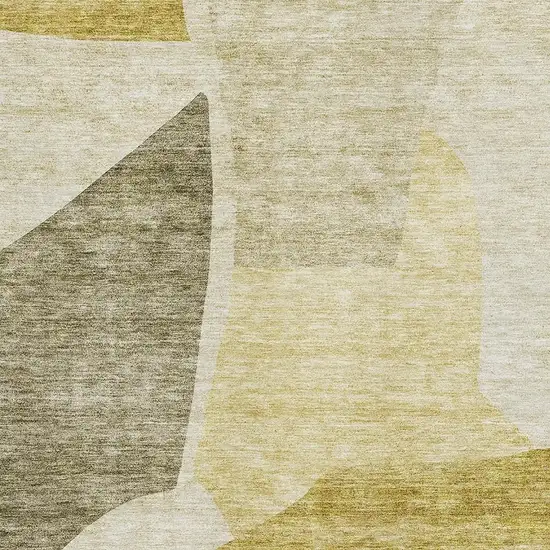 Gold And Ivory Abstract Washable Area Rug With UV Protection Photo 4