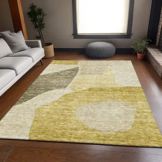 Gold And Ivory Abstract Washable Area Rug With UV Protection Photo 2