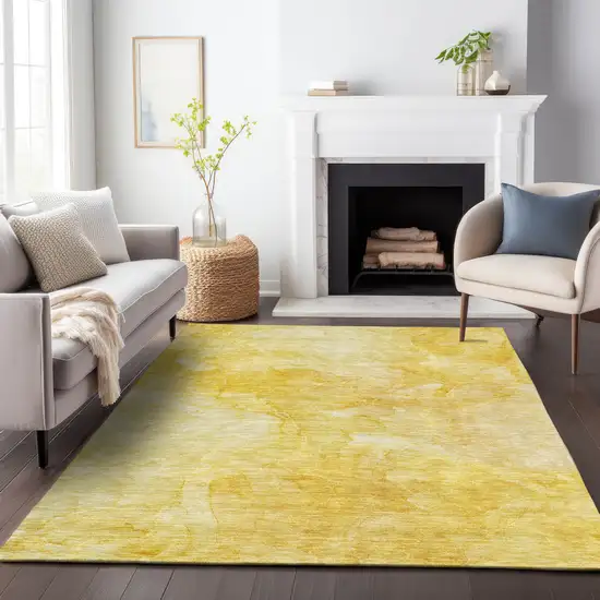 Gold And Ivory Abstract Washable Area Rug With UV Protection Photo 4