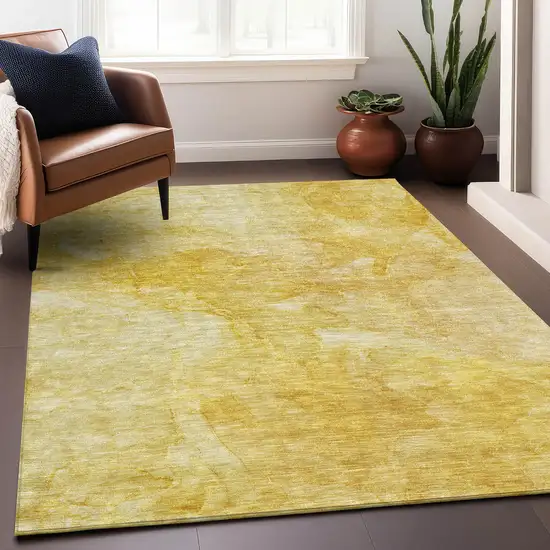 Gold And Ivory Abstract Washable Area Rug With UV Protection Photo 5