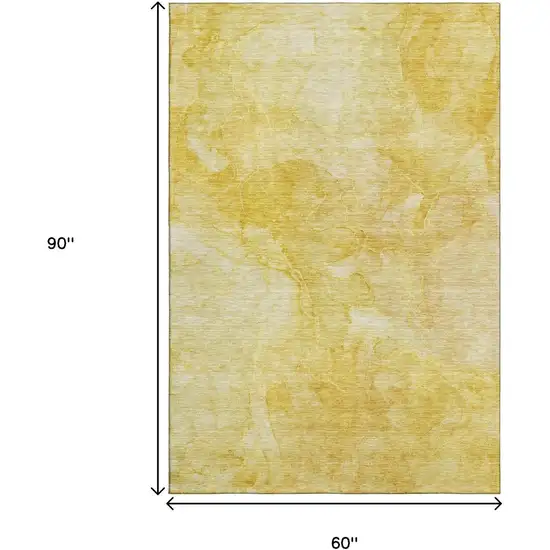 Gold And Ivory Abstract Washable Area Rug With UV Protection Photo 3