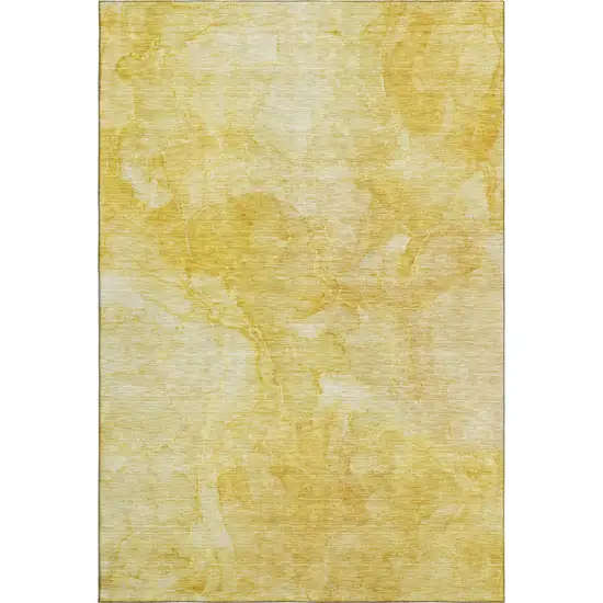 Gold And Ivory Abstract Washable Area Rug With UV Protection Photo 1