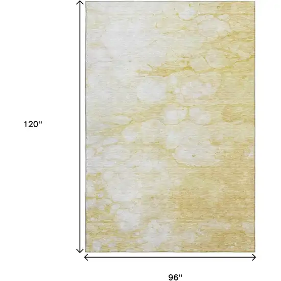 Gold And Ivory Abstract Washable Area Rug With UV Protection Photo 3