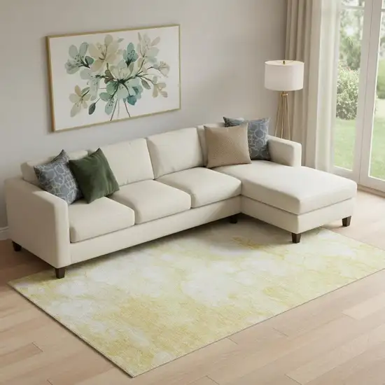 Gold And Ivory Abstract Washable Area Rug With UV Protection Photo 1