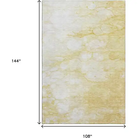 Gold And Ivory Abstract Washable Area Rug With UV Protection Photo 3