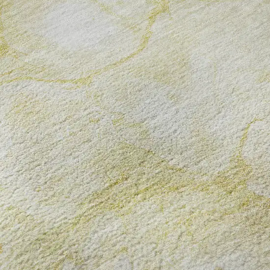 Gold And Ivory Abstract Washable Area Rug With UV Protection Photo 9