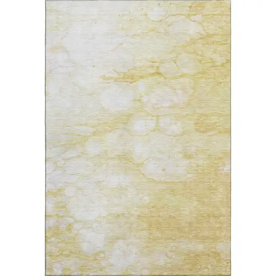 Gold And Ivory Abstract Washable Area Rug With UV Protection Photo 1