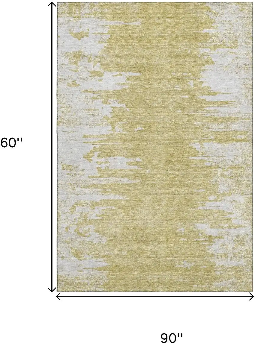 Gold And Ivory Abstract Washable Area Rug With UV Protection Photo 3