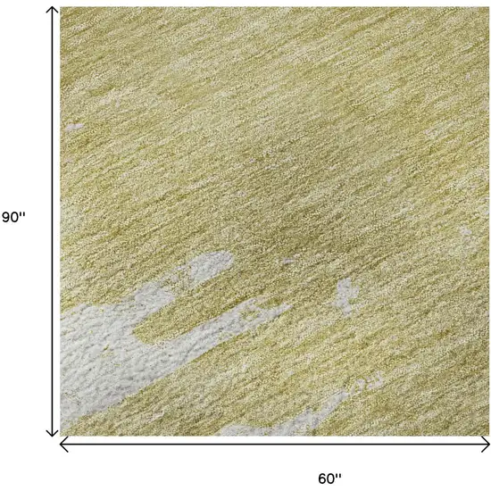 Gold And Ivory Abstract Washable Area Rug With UV Protection Photo 8