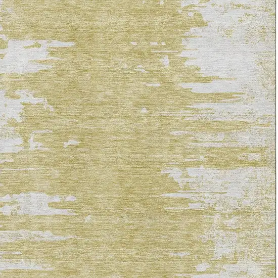 Gold And Ivory Abstract Washable Area Rug With UV Protection Photo 4