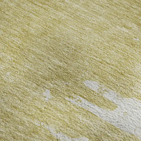 Gold And Ivory Abstract Washable Area Rug With UV Protection Photo 2