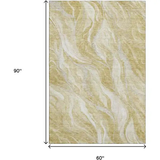 Gold And Ivory Abstract Washable Area Rug With UV Protection Photo 3