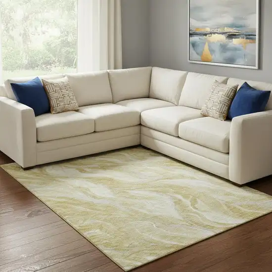 Gold And Ivory Abstract Washable Area Rug With UV Protection Photo 1