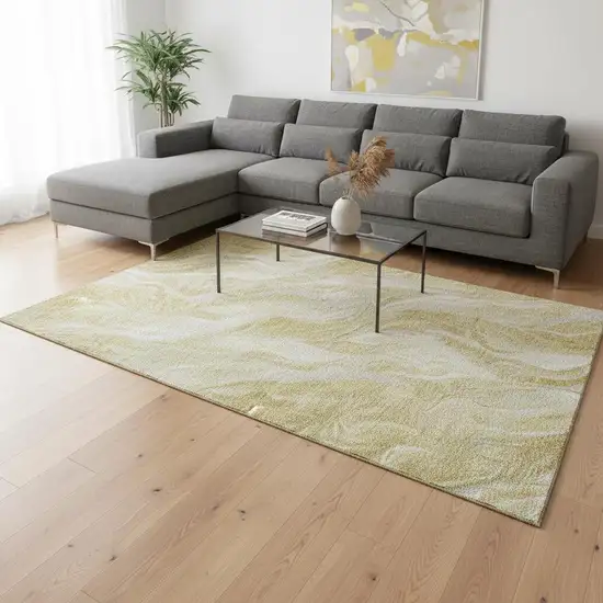 Gold And Ivory Abstract Washable Area Rug With UV Protection Photo 1