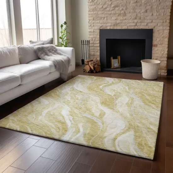 Gold And Ivory Abstract Washable Area Rug With UV Protection Photo 4