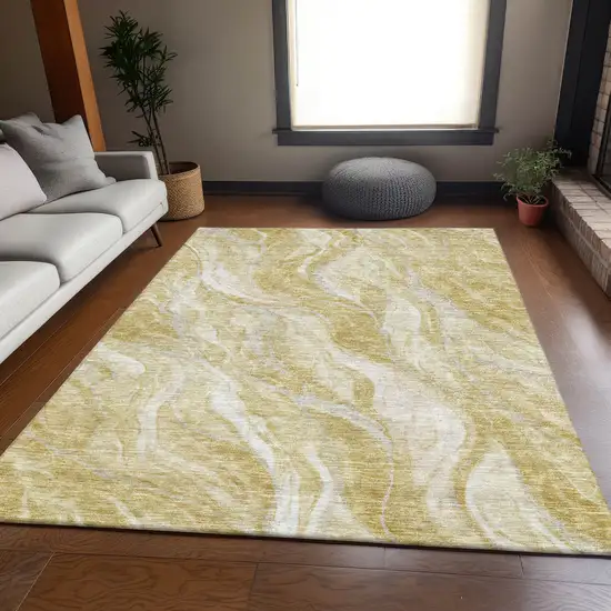 Gold And Ivory Abstract Washable Area Rug With UV Protection Photo 5