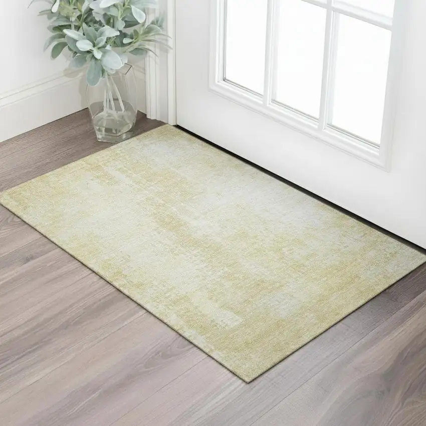 Gold And Ivory Abstract Washable Area Rug With UV Protection Photo 2